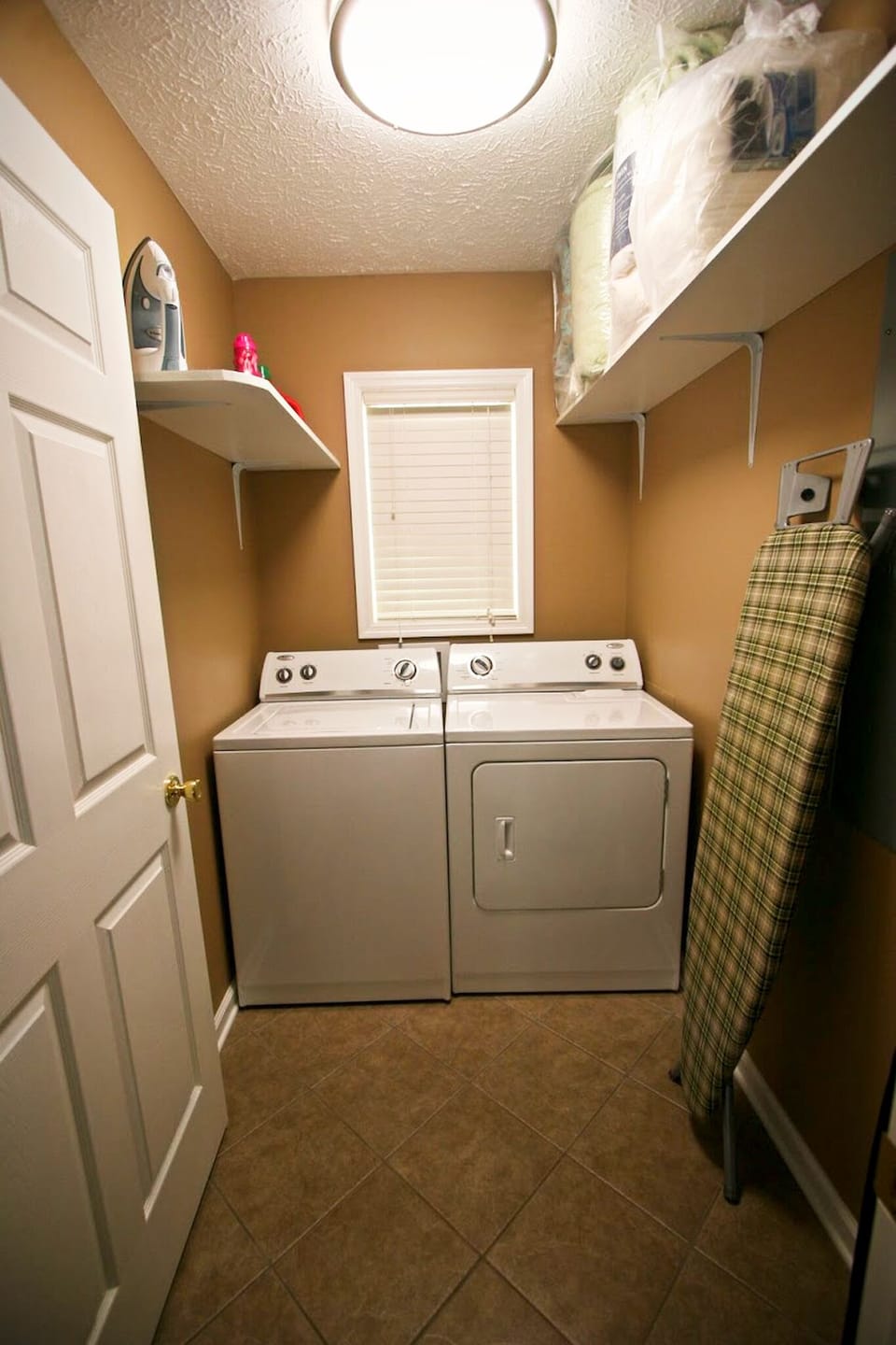 Laundry room with washer and dryer.