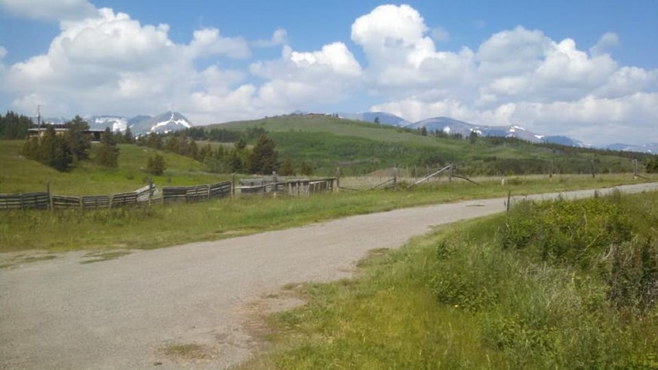 View of Glacier Park peaks from the front of the house.
