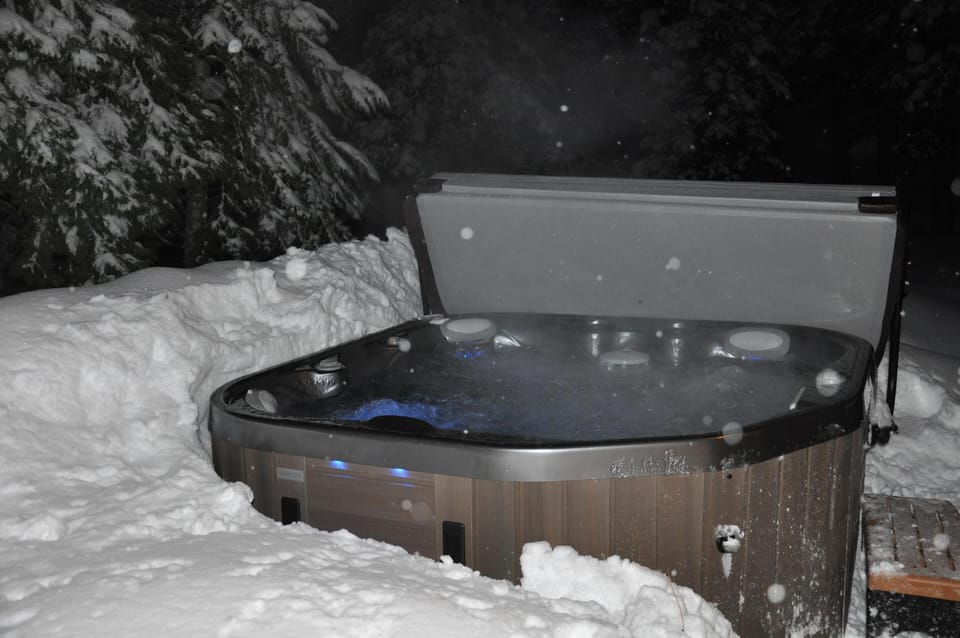 Hot tub on a snowy night