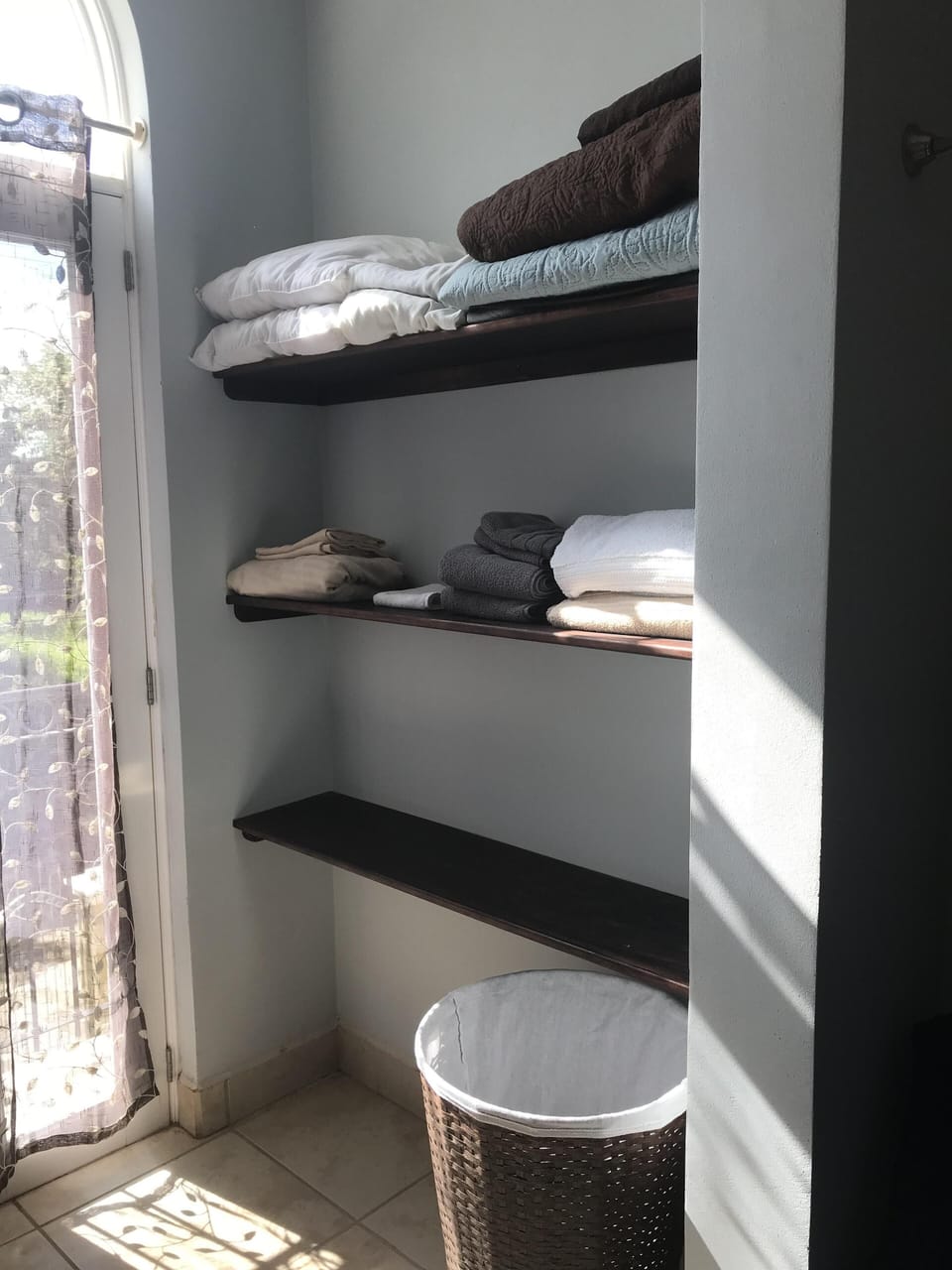 Ample closet space and laundry hampers provided
