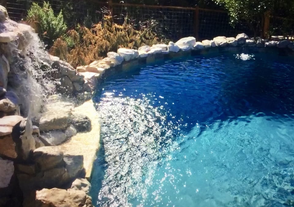 Kickin Back - The waterfall is a wonderful, soothing sound for relaxing on the patio.