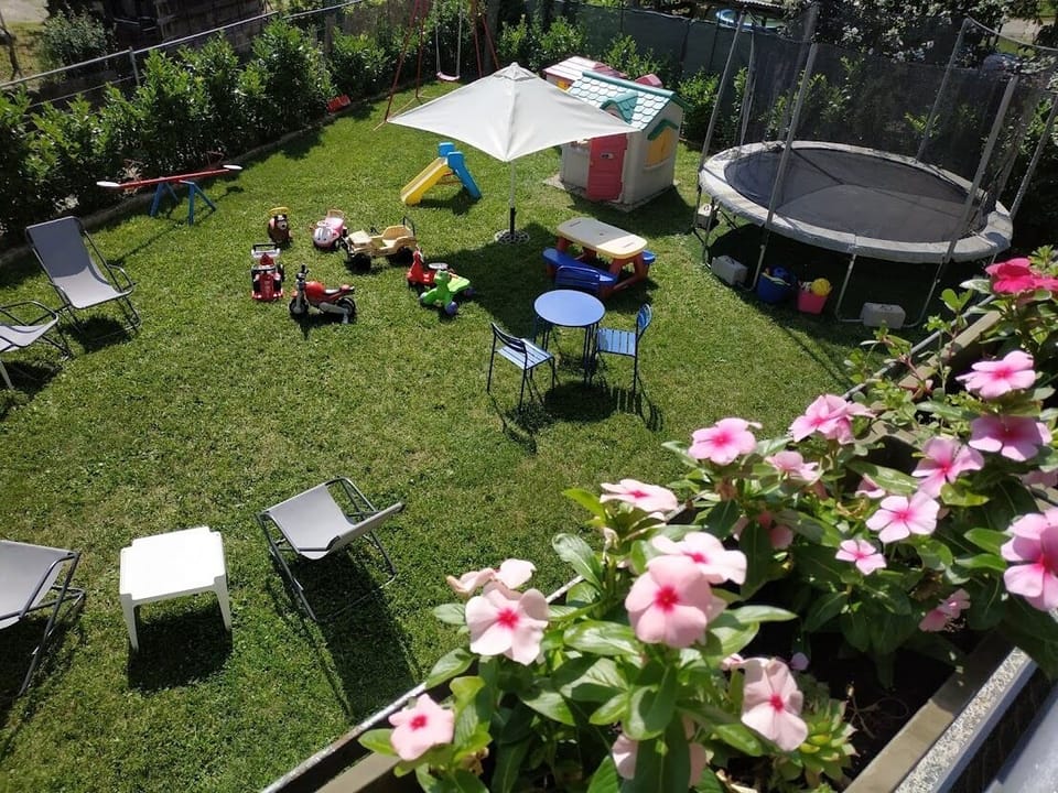 Playground with wide trampoline for teen agers and kids