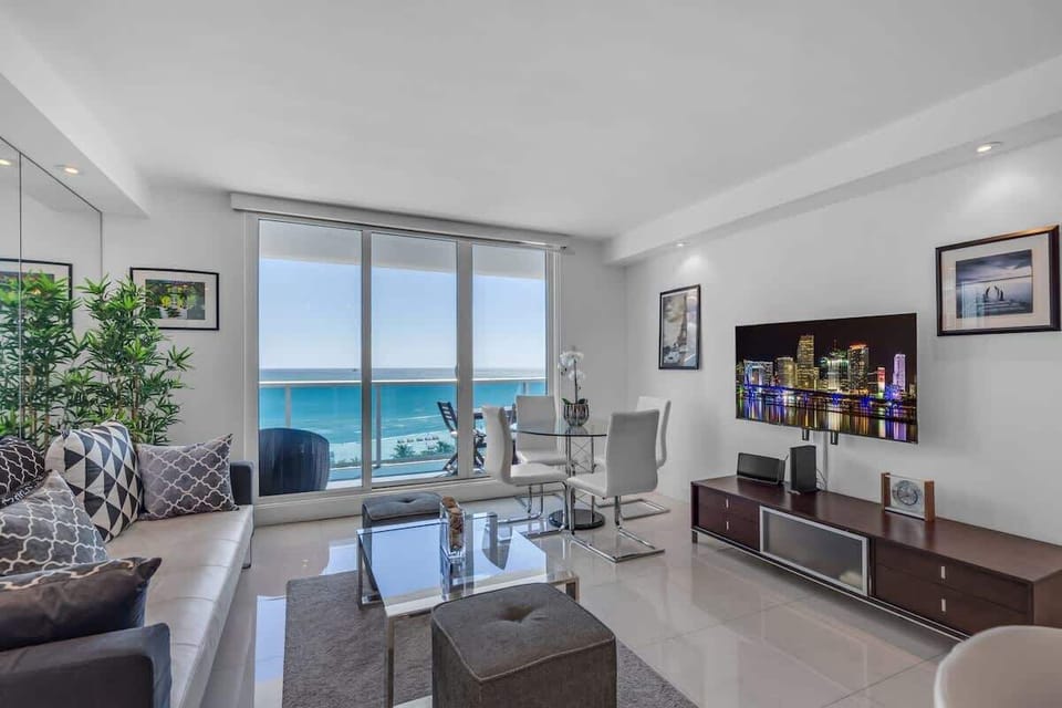 "Relax with ocean views and modern comforts—stream your favorites or step onto the balcony for sea breezes!"
