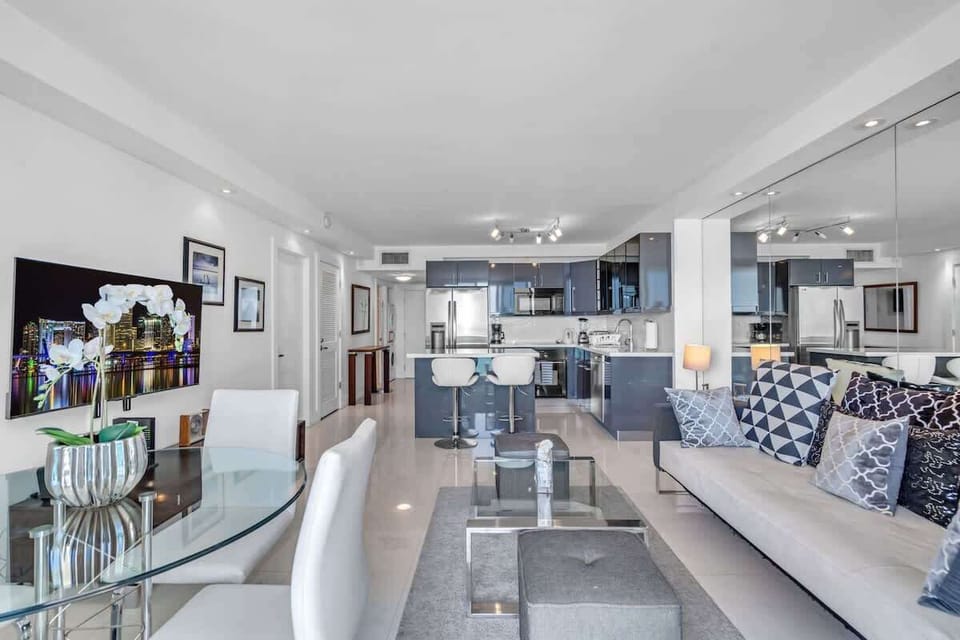 "Cook, dine, and unwind in this chic open-concept space—ideal for long stays and entertaining!"
