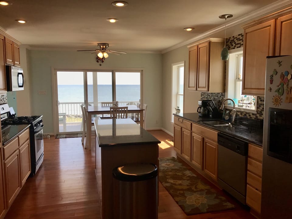 Gourmet kitchen with gas oven and stove. Everything needed to cook for a group.