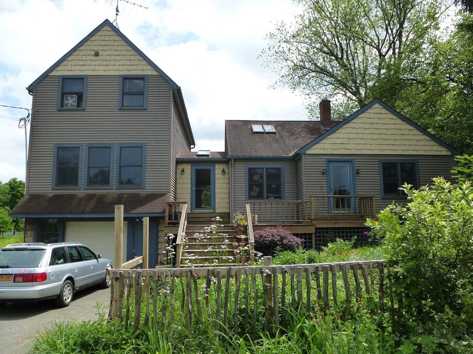 Front of house with seasonal cottage garden