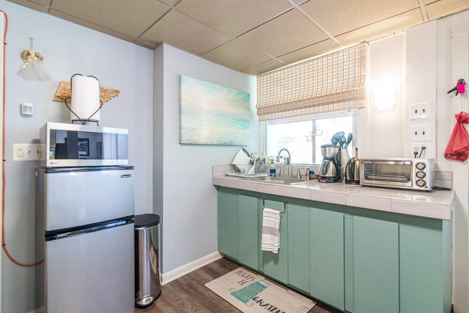 kitchenette: simple cooking: microwave, 2 burner stove top , coffee, large frig 