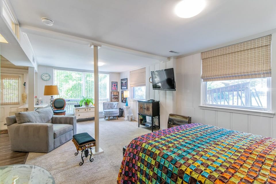 Queen bed in the large open space