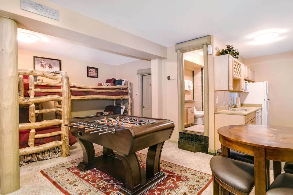 Bunk Room with foosball, game table, kitchenette, and private bath, 8 Twin beds