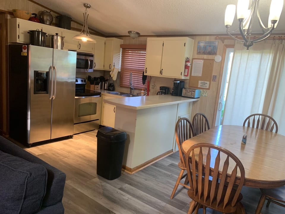 Kitchen features stainless steel appliances