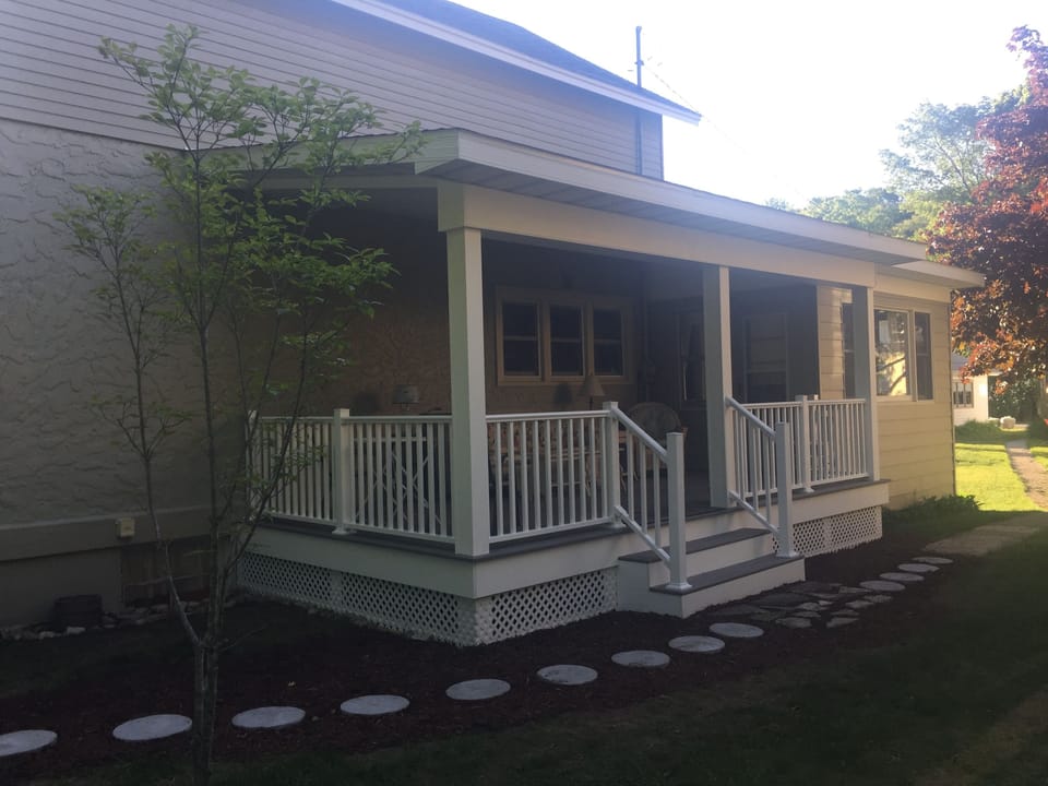 Porch is 10x20; room for sofa, loveseat, rocker and table with 4 chairs