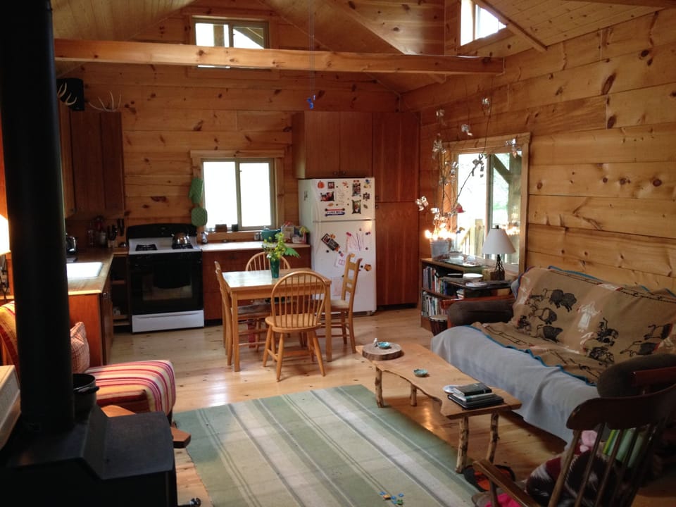 Skylight and lots of windows make for a bright, airy kitchen and sitting room.