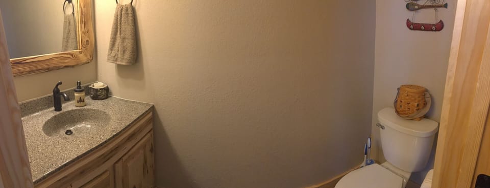 Upstairs half bath off entryway 