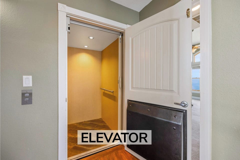 Surf or Sound Realty - 683 - Rising Sun - Elevator - Label