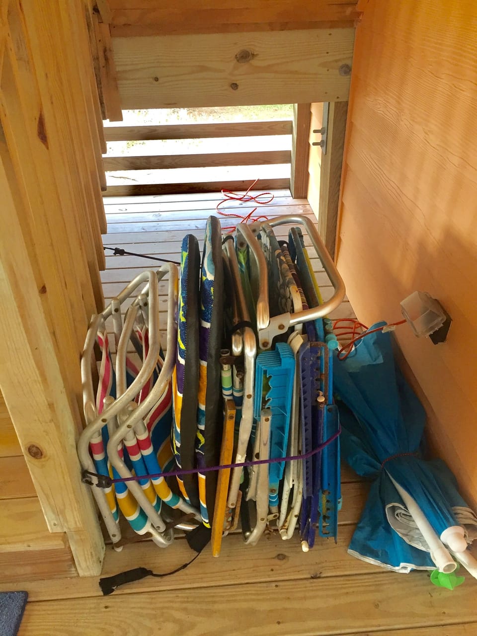 Chairs, boogie boards and umbrellas for your use