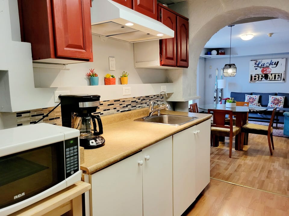 Prepare light meals in the kitchenette. (Note: No stovetop or oven in the unit.)