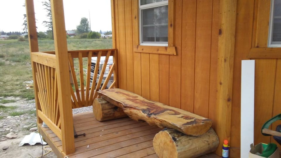 log bench on porch
