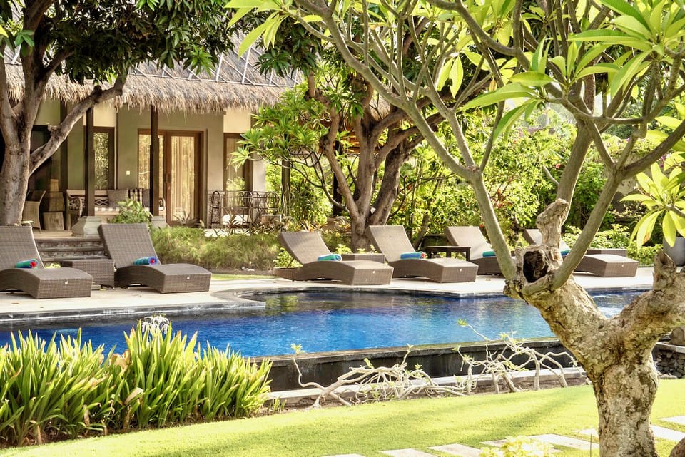 Beautiful grounds and sparkling pool at Villa Wilali.
