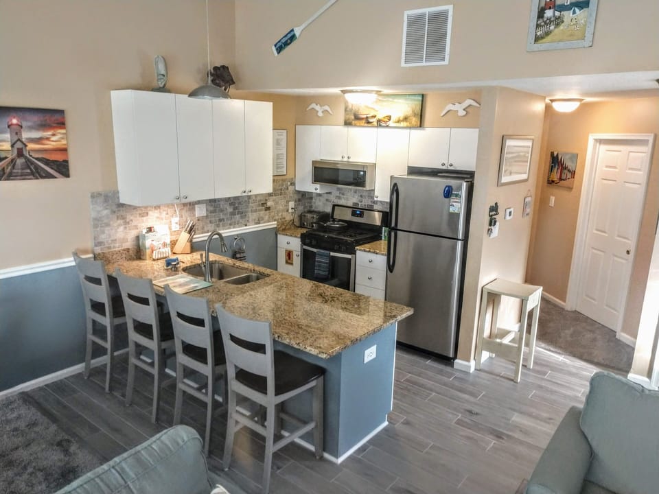 Updated kitchen w/ stainless steel appliances.
