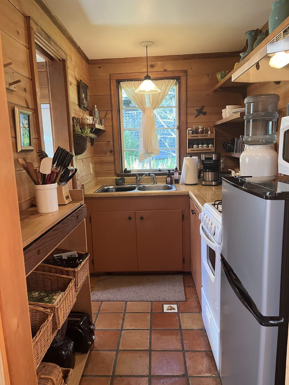 Gas stove, apartment size refrigerator, 3 gallons filtered water, basic supplies