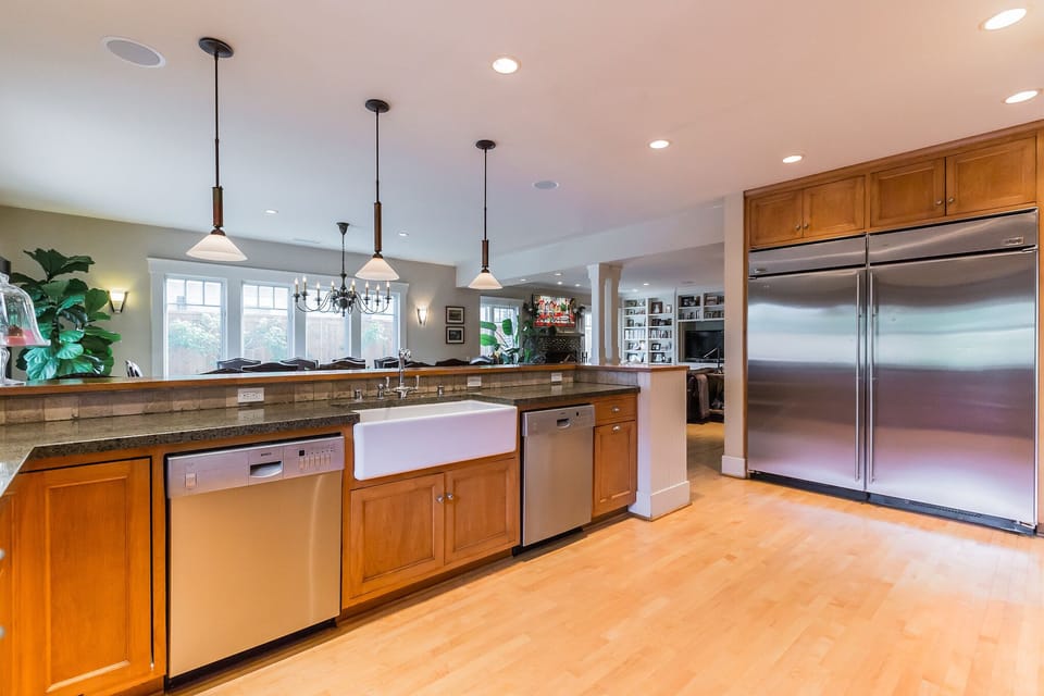 kitchen with dual dishwashers and side by side freezer/refrigerator 