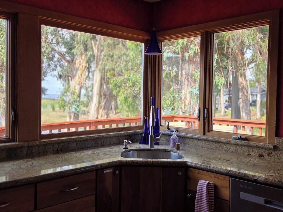 Kitchen window with ocean and lake view