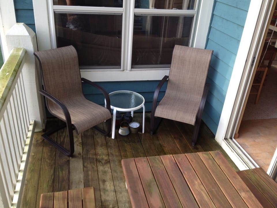 Seating area next to picnic table.