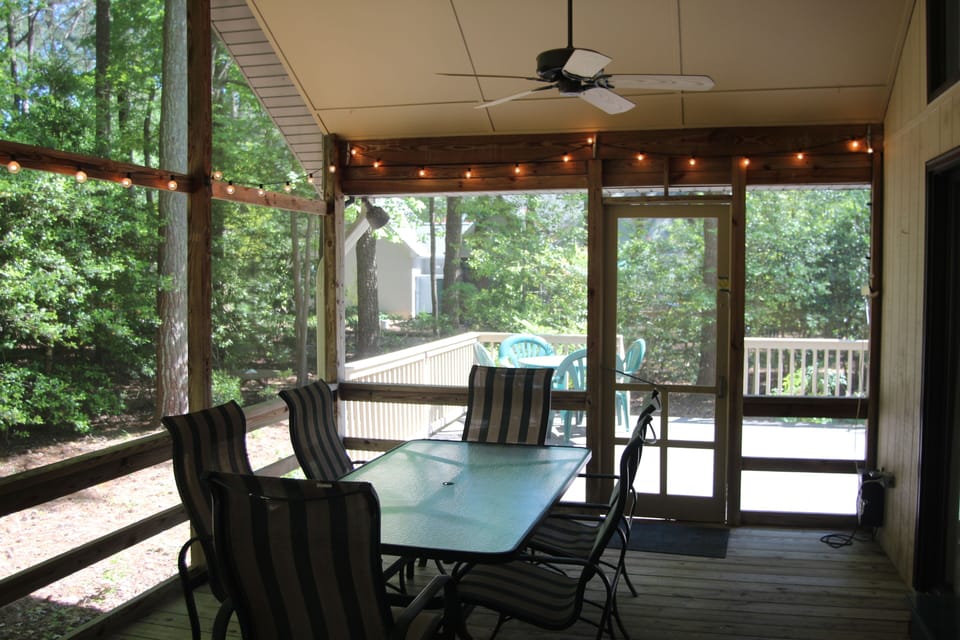 6 seat table on screen porch