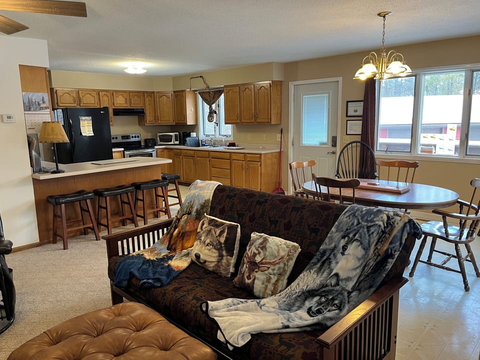 Open living room, dining room and kitchen area. 