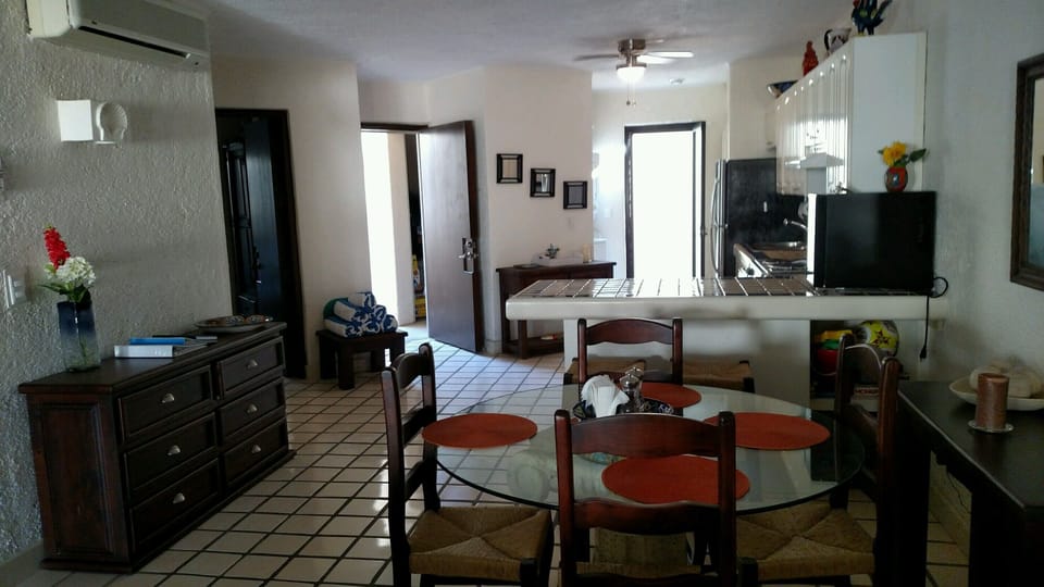 Dining room, kitchen, laundry room. 