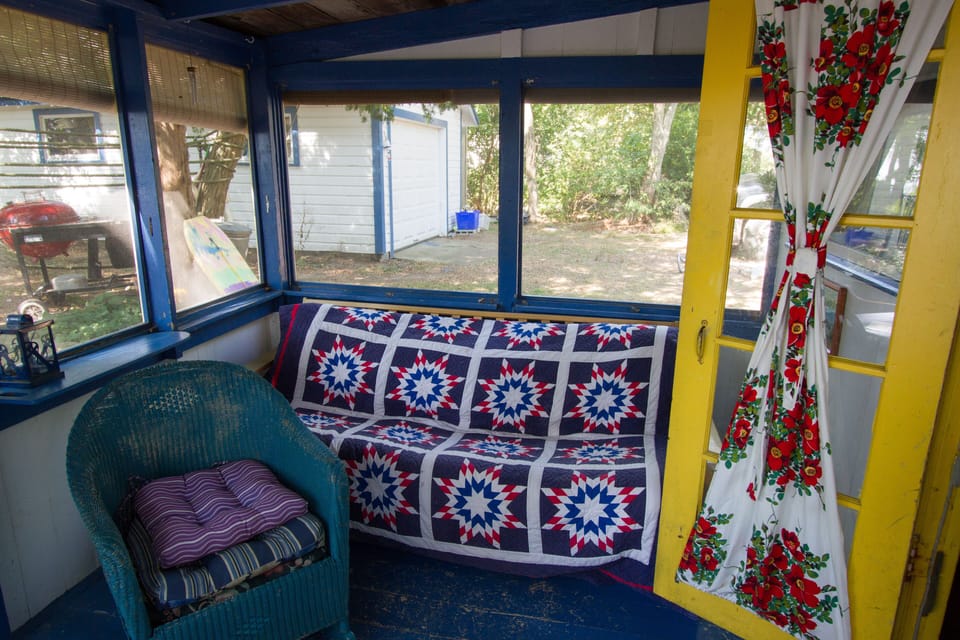 Futon mattress on the screened-in porch 
