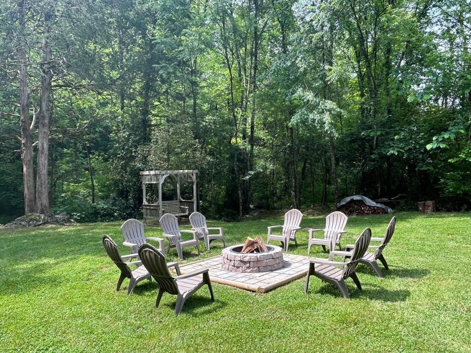Private large fire pit area.  Over an acre of area for privacy & kids to play