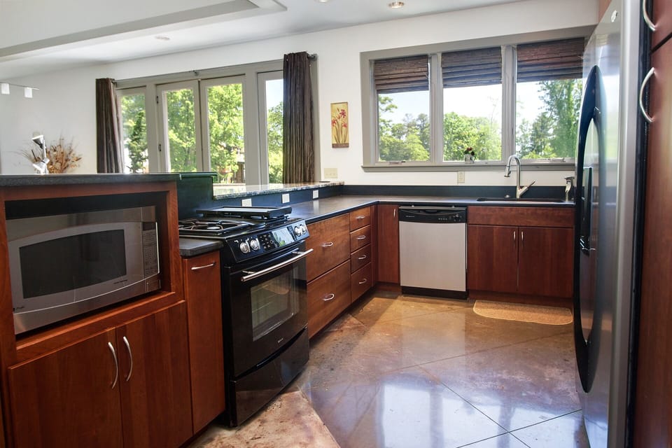 Large upstairs Kitchen, service for 16, well stocked for all your cooking needs 