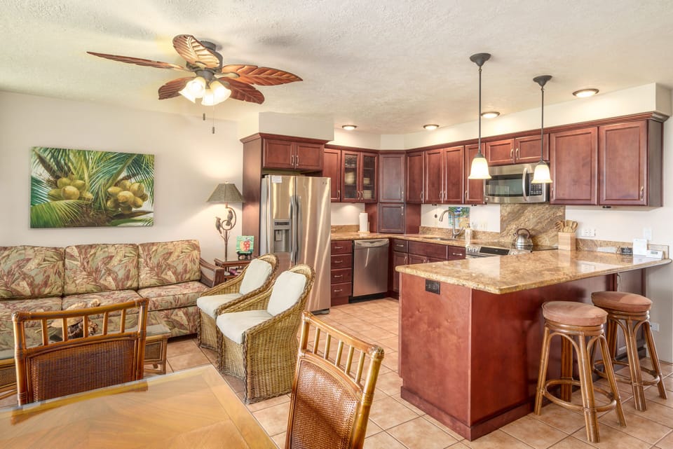 Living room, large fully stocked kitchen and plenty of seating. 
