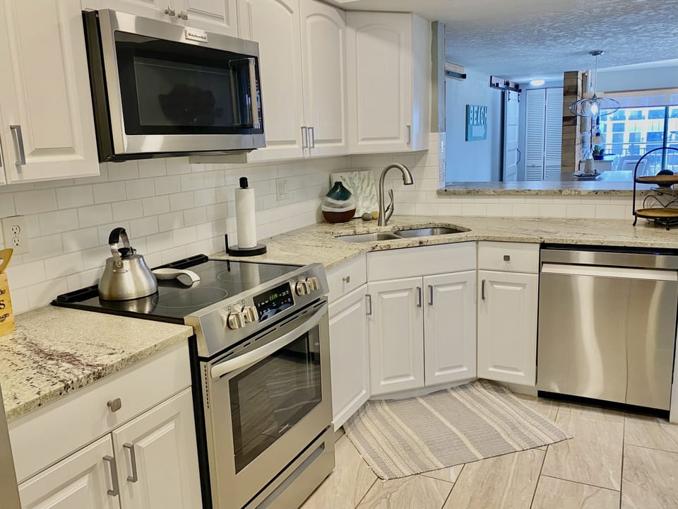 Bright kitchen open to all rooms, all new ss appliances