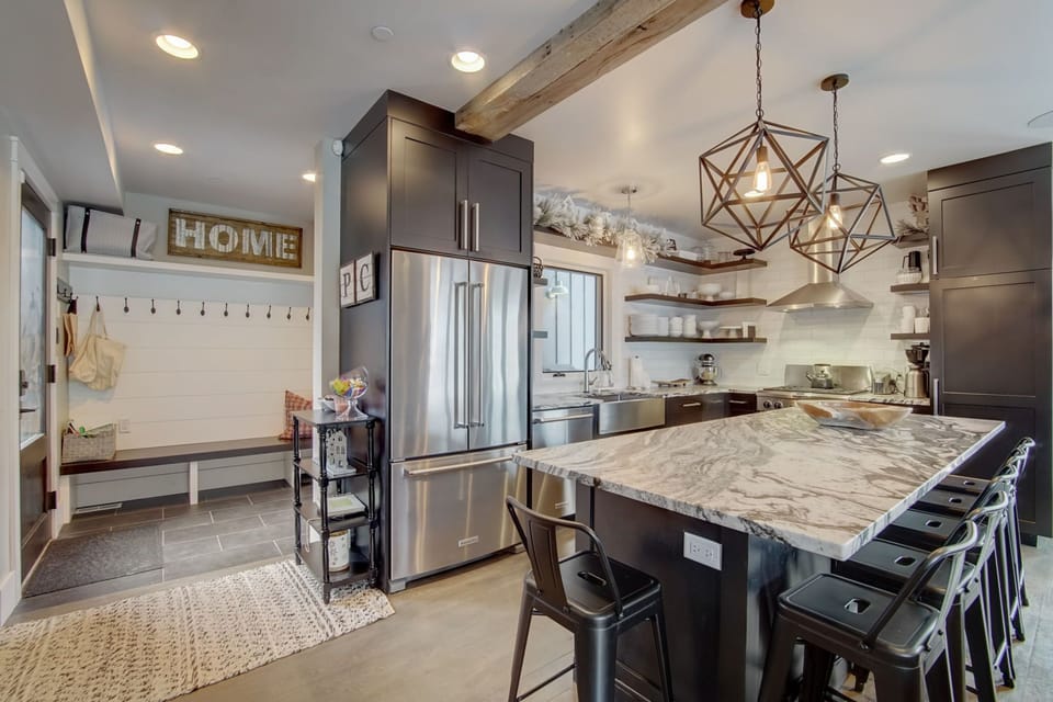 Gourmet Kitchen-large island seats 8, fully stocked with all of the amenities 