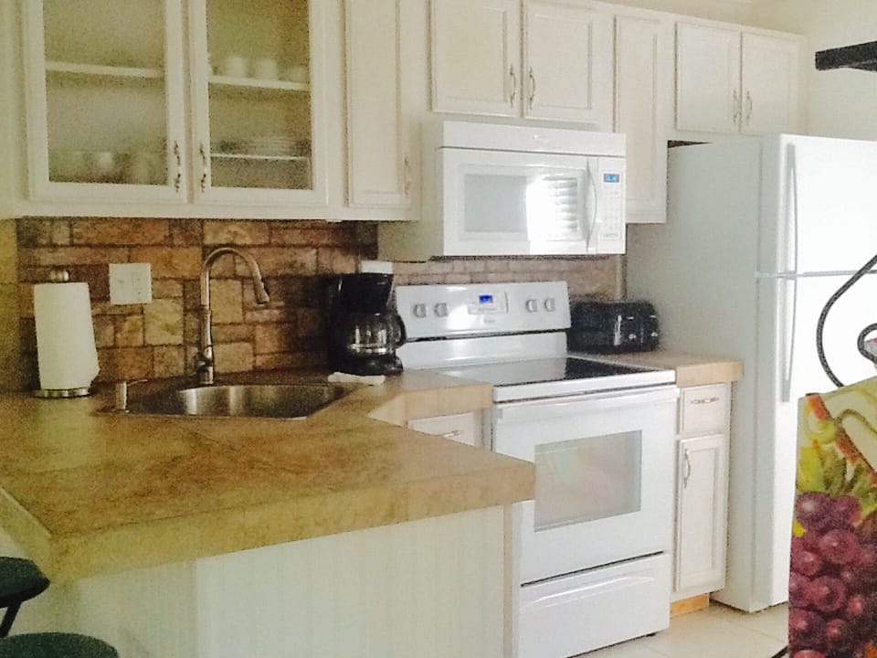 KITCHEN WITH ALL
NEW APPLIANCES AND A DISHWASHER
