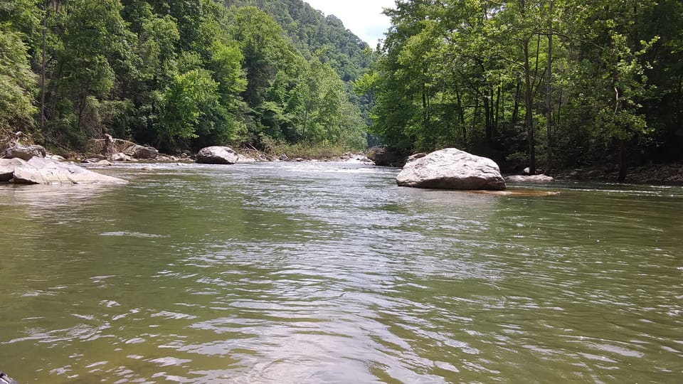 Canoe to rapids on Watauga River ~30 minutes.