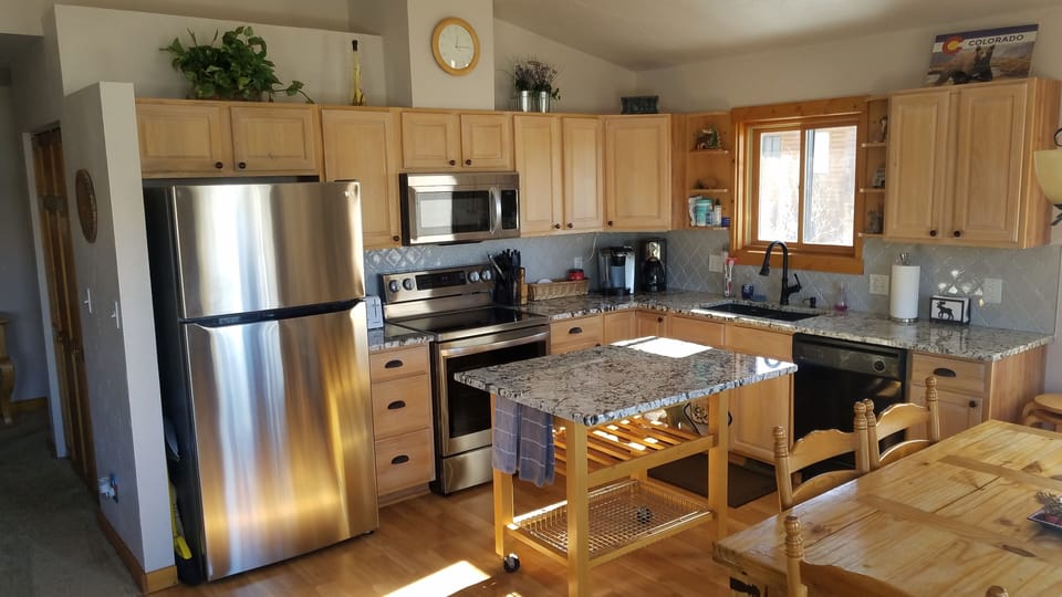 New stainless appliances & granite counters provide endless cooking capability 