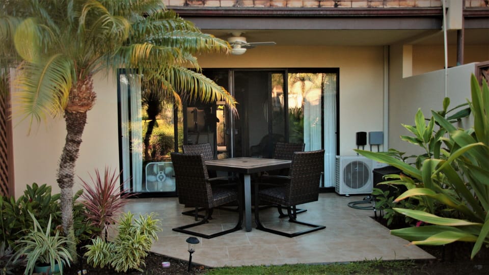 Tiled Lanai with split air unit and lanai fan. Great place for morning coffee!