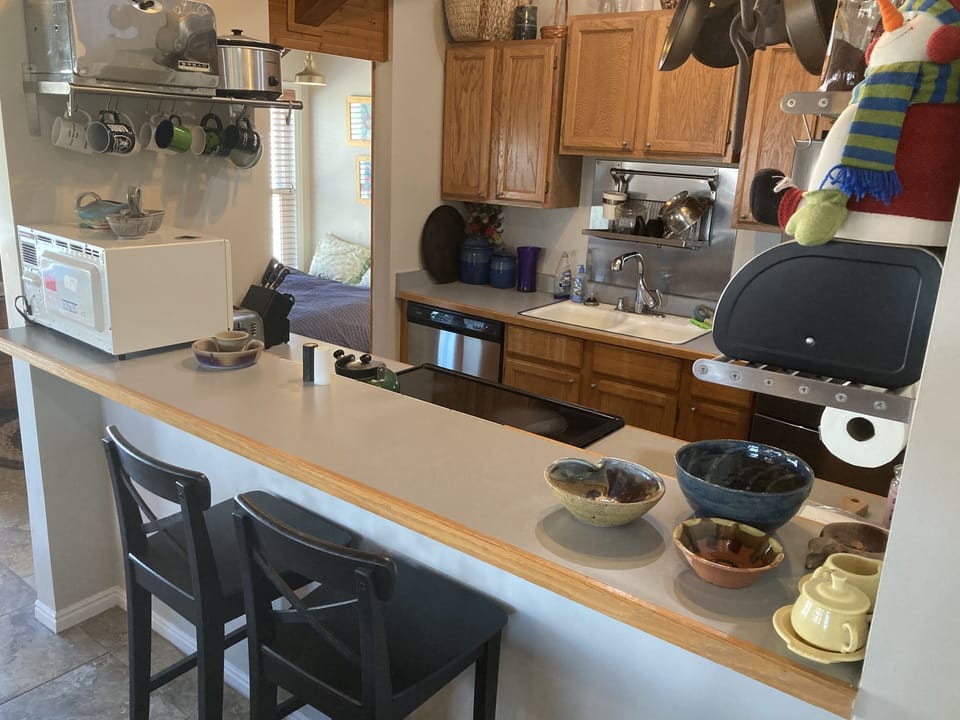 Bar at kitchen facilitates visiting while cooking.