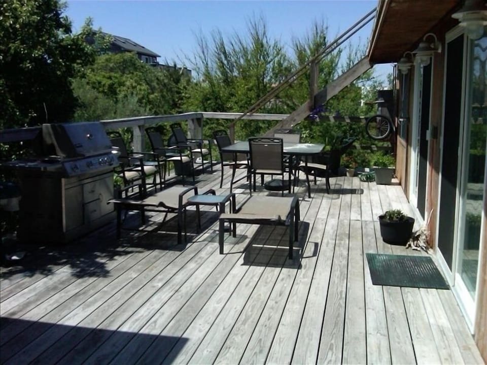 back patio with BBQ and rooftop deck with full 360 degree views