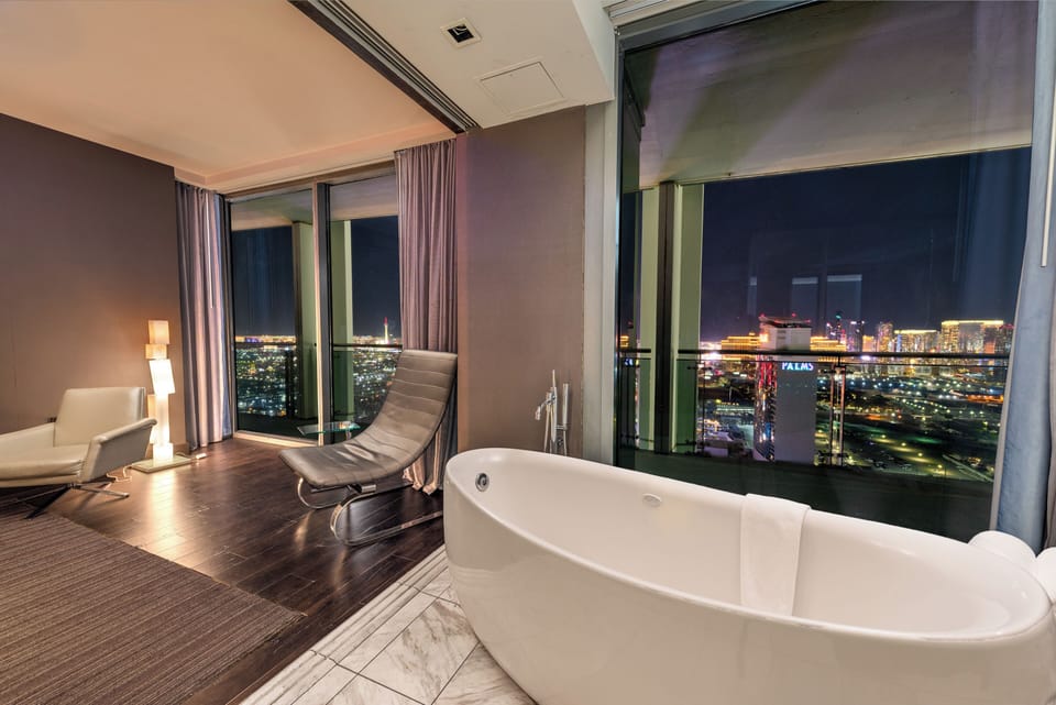 Freestanding Jacuzzi tub in-master bedroom view of the gorgeous Las Vegas  strip