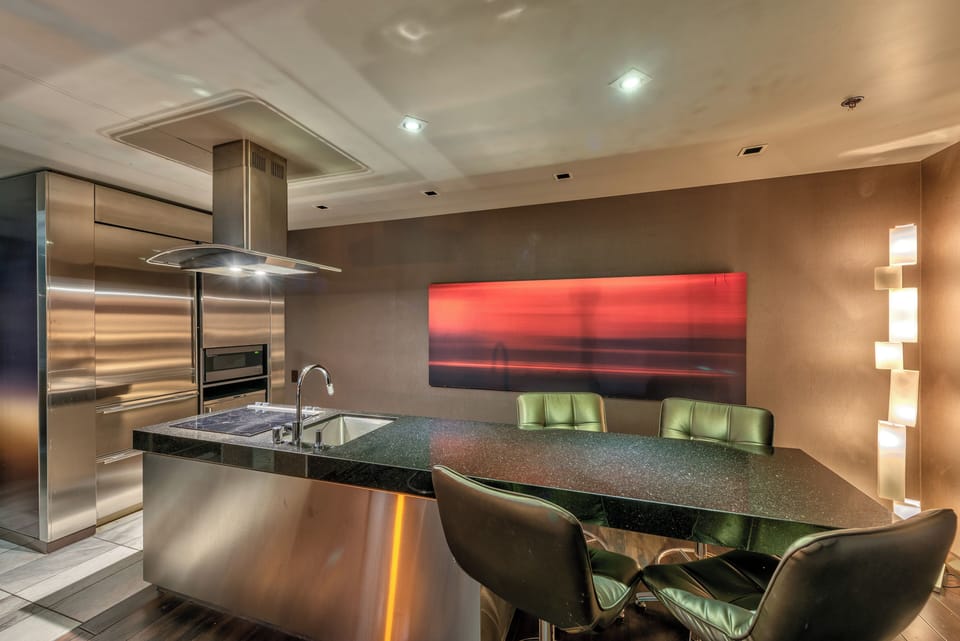 Kitchen/dining area. SubZero refrigerator, cooktop, microwave, airfryer &toaster