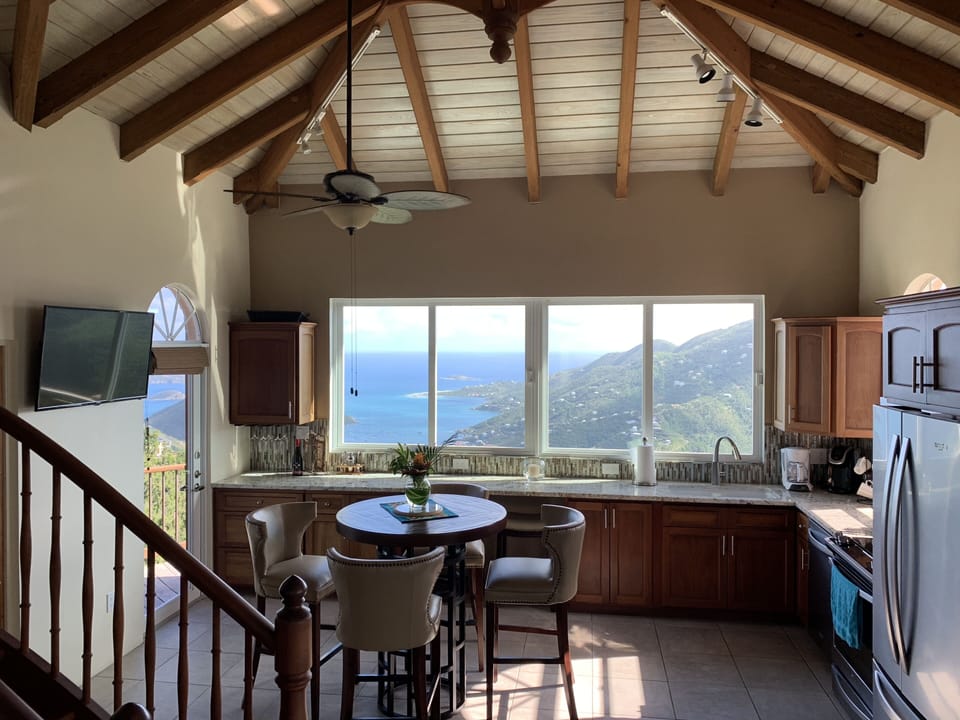 SEAclusion's kitchen with Coral Bay ocean views
