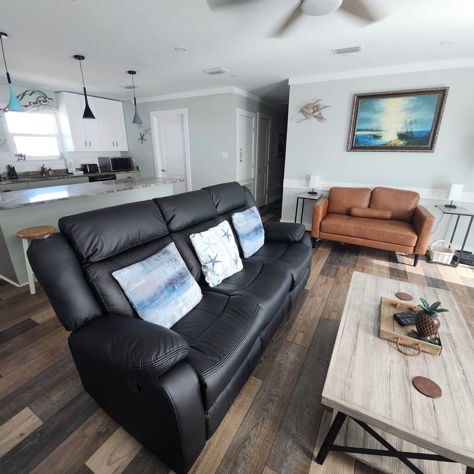 New double reclining leather sofa