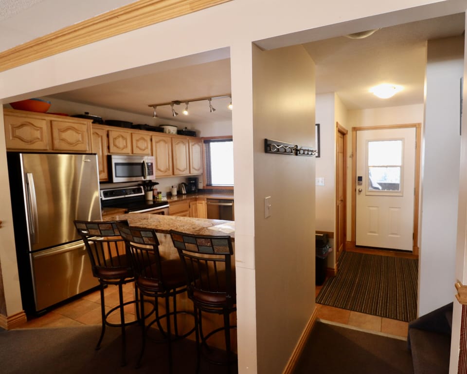 Back deck entry adjacent to kitchen