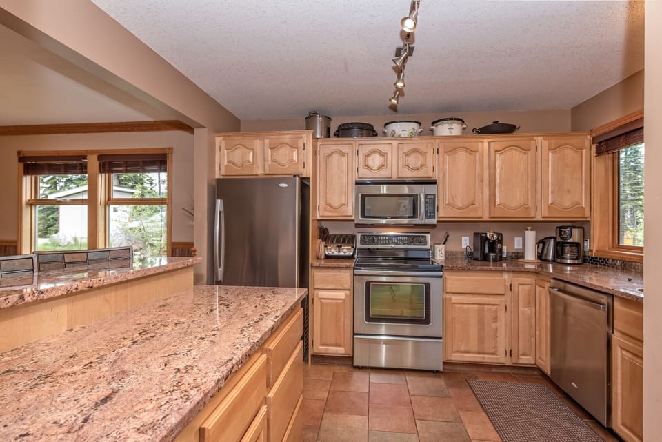 Modern and well stocked kitchen.  