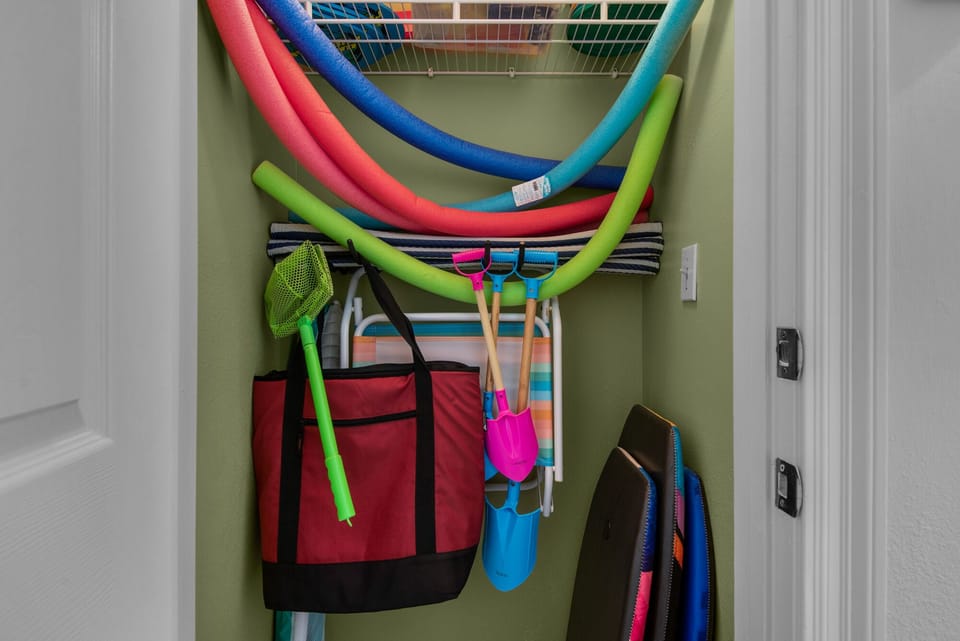 Front Storage Closet dedicated to Beach/Pool Toys, Charis, Umbrellas, etc.