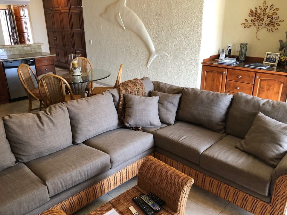 Nice newly upholstered large sofa is also a sleeper sofa.  Desk has lots of info